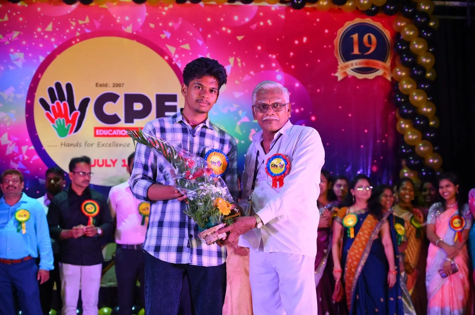 Student receiving a memento